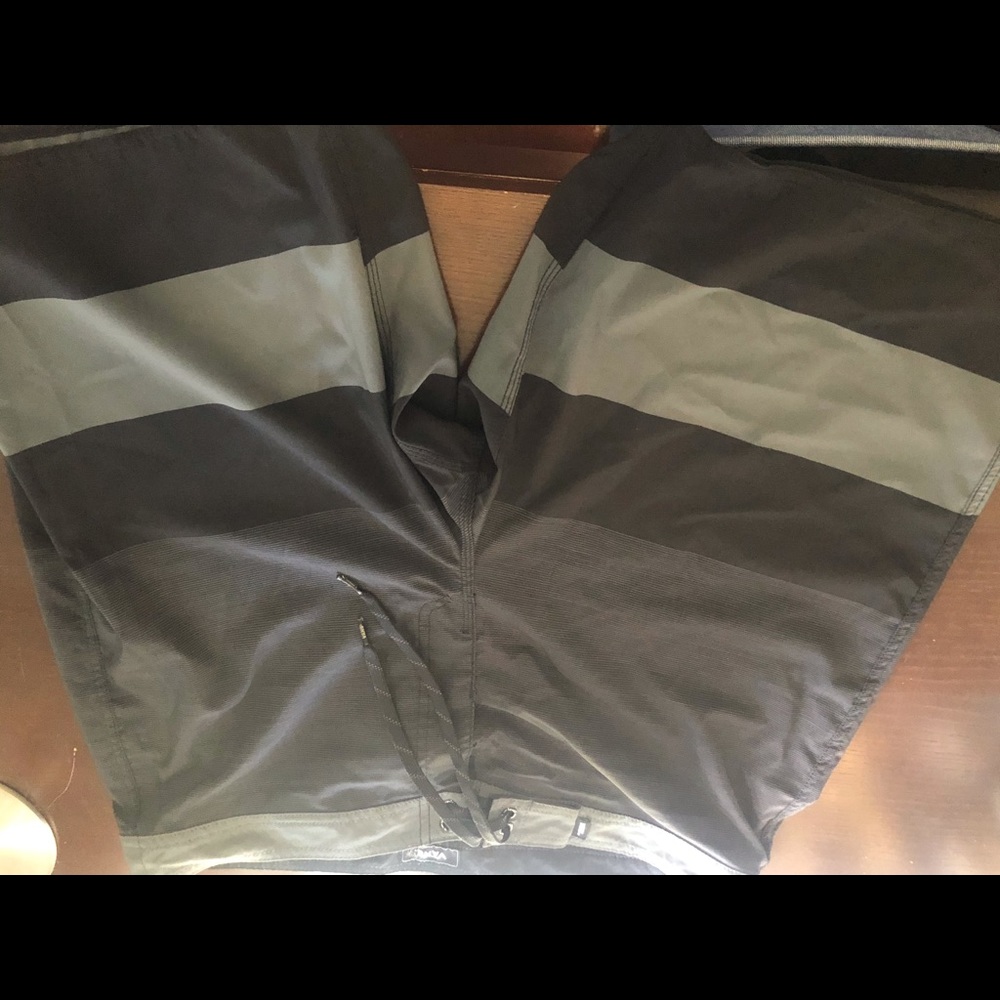 Vans black and grey board shorts.